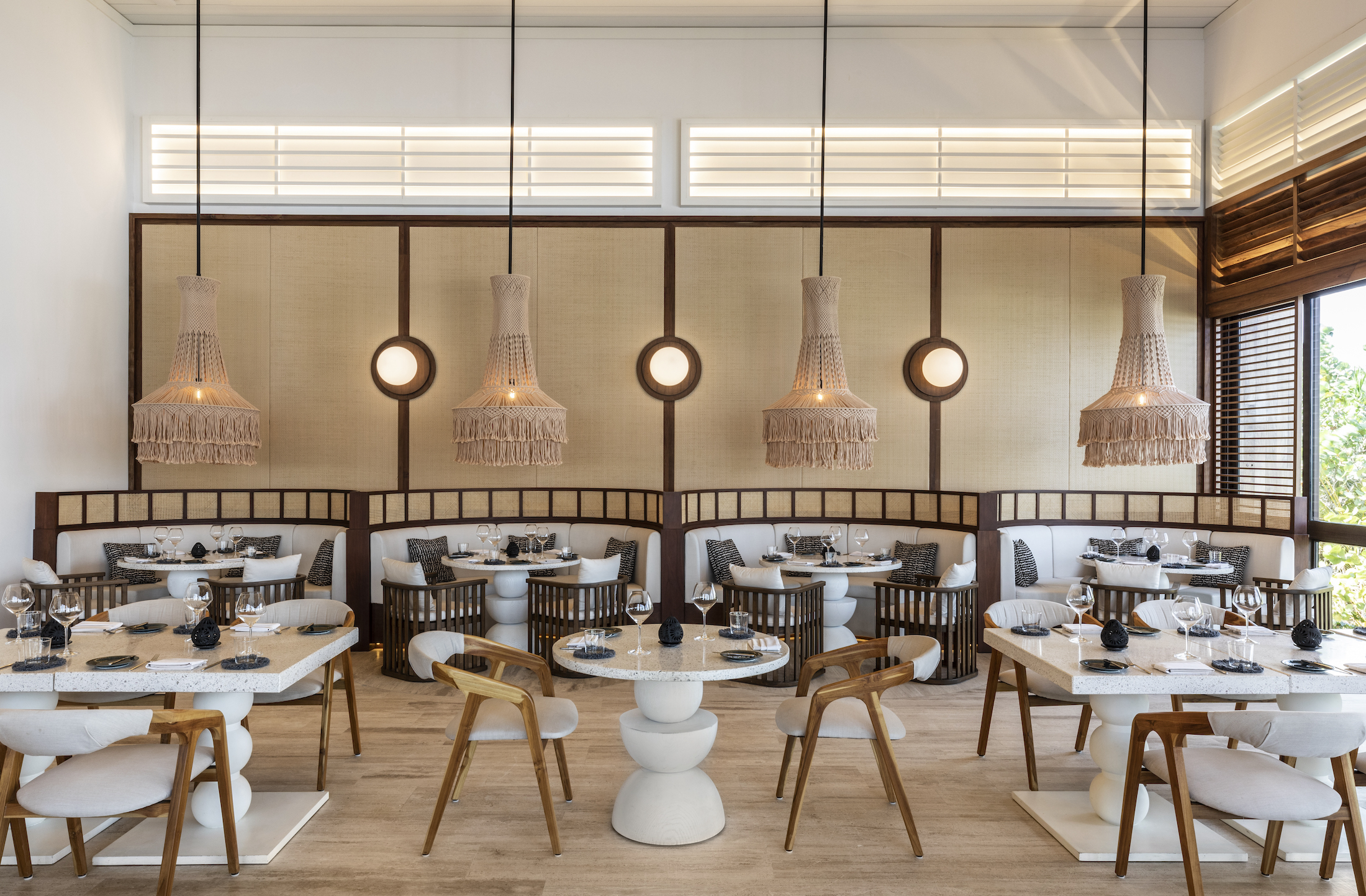 Seating areas at Fairmont Mayakoba's Gaia restaurant.